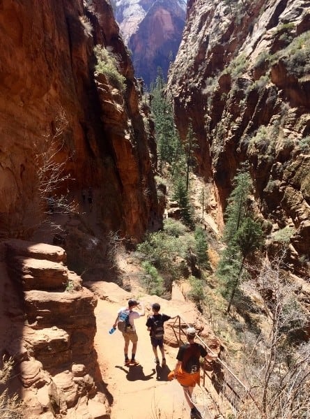 Three people on the Angels Landing trail in Zion National Park