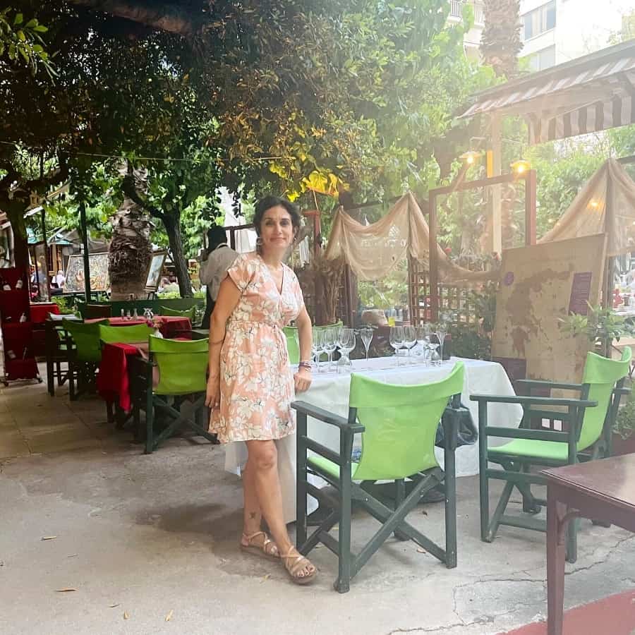 Athens tour guide Penelope Triantafyllidou in the charming Proskopon Square, a locals favorite in Athens