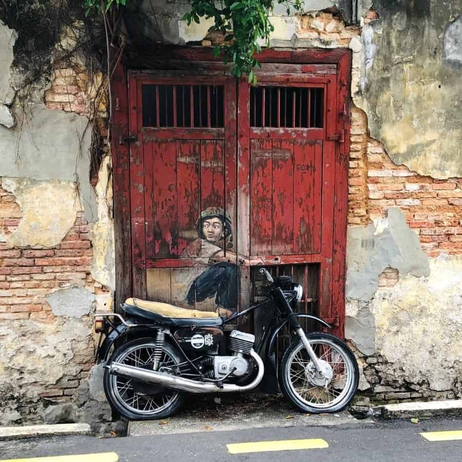 Boy On Motorbike street mural in Penang Malaysia