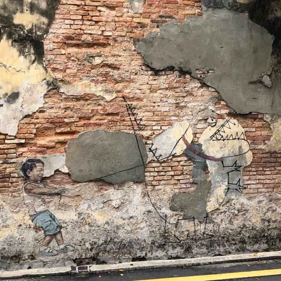 Little Boy and Pet Dinosaur Mural in George Town, Malaysia