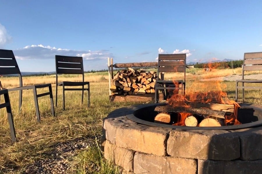 A campfire at Under Canvas for cooking smores