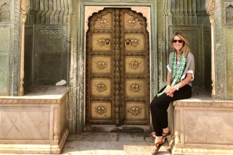 Momcation - Susan sitting at the leheyria spring gate, at city palace jaipur