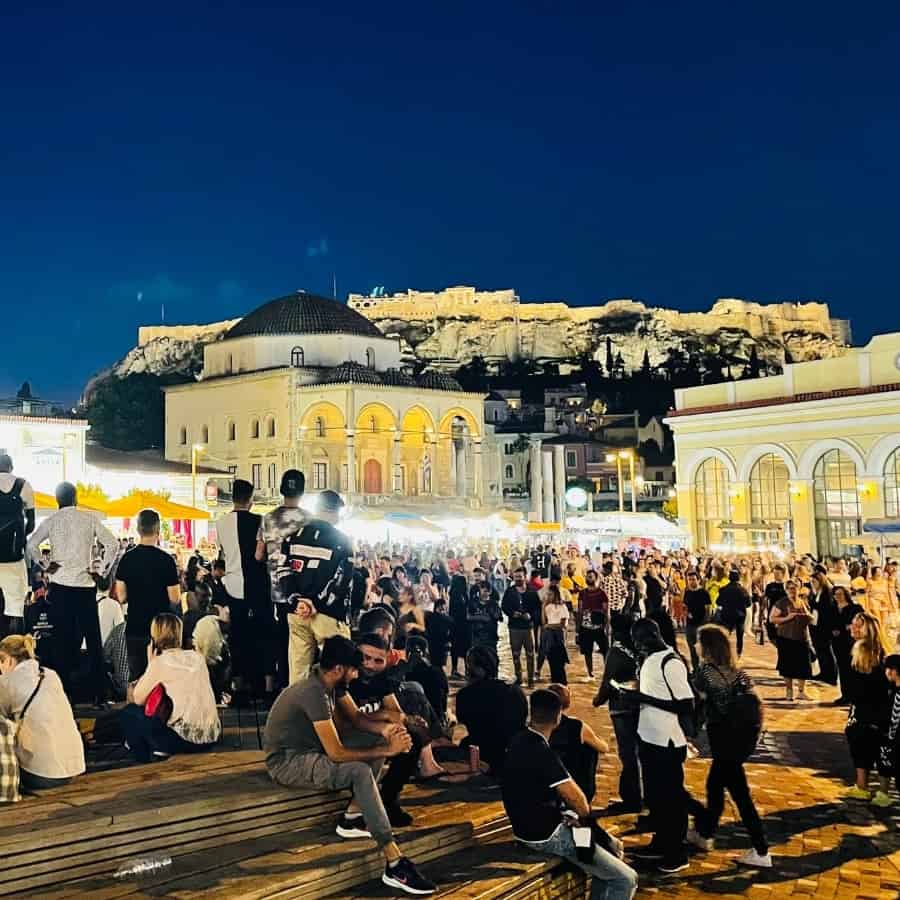 Monastiraki Square filled with locals and tourists on a spring evening