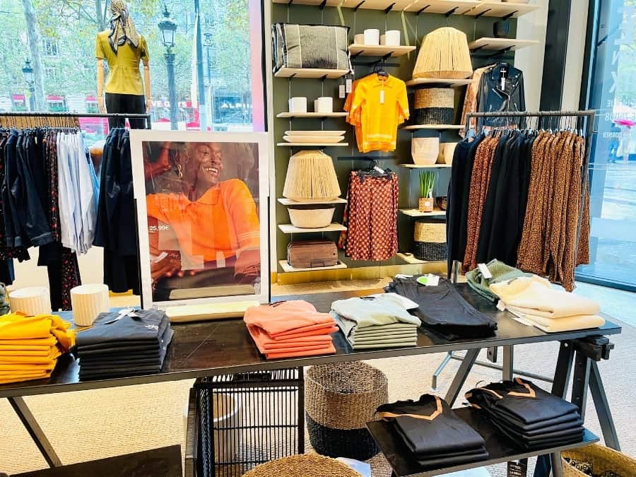 A fall clothing display at Monoprix Paris, an affordable French clothing store
