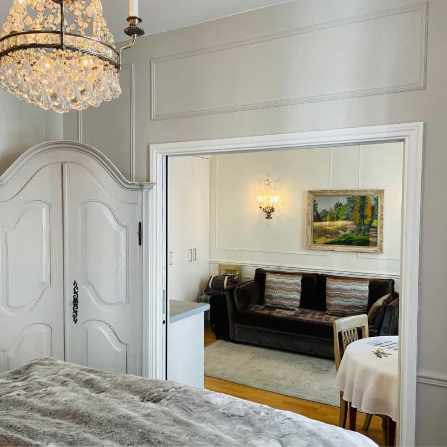 A Paris apartment with a view into a dining and living room area