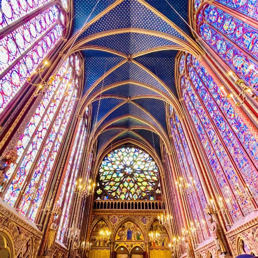 The stunning stained glass panels of the Sainte-Chapelle cathedral ceiling, a must-see Paris attraction.