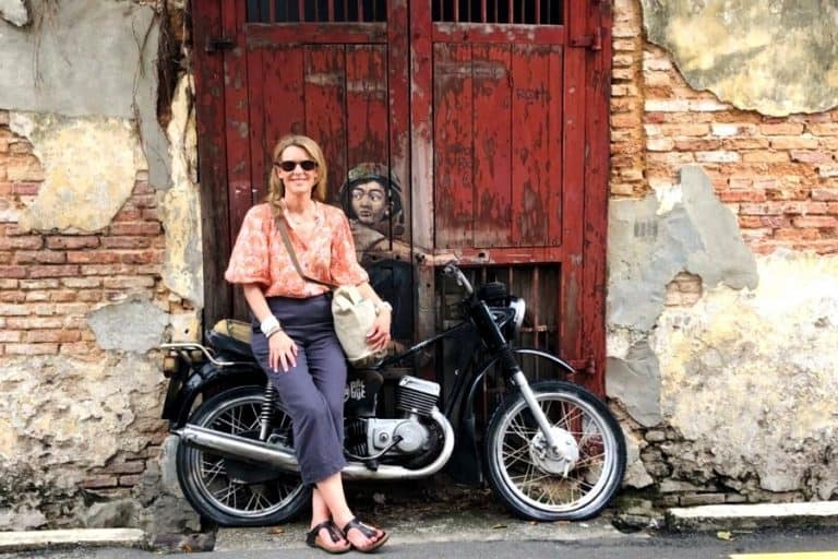 Susan Heinrich with Boy on Motorbike Street Art in Penang Malaysia