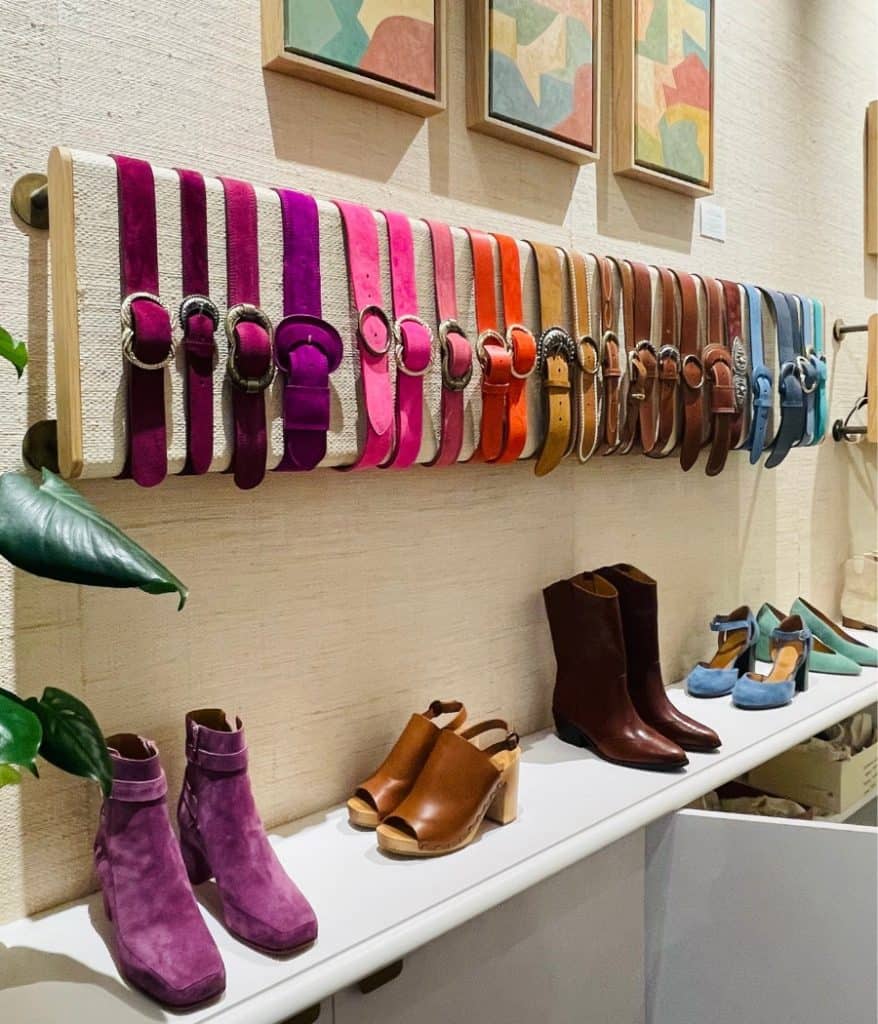 Colorful shoes, boots and belts on display in the Paris Sézane store, L'Appartement Sézane, in the second arrondissement.