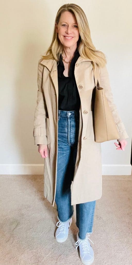 Susan in jeans and a classic trench coat