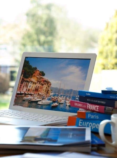 Researching how to afford travel with a laptop and Europe guide books