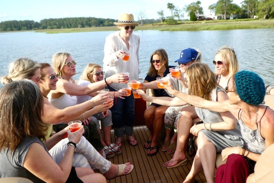 Women toast a friend's 50th birthday on a boat cruise in South Carolina
